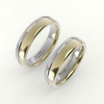 Tweedelige witgouden en gouden trouwring, met afgeronde band.