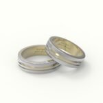 Goud met witgoud trouwring met inkeping design.