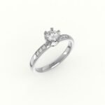 Witgouden solitaire ring met diamanten in de band.