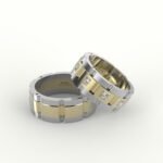 Goud en witgoud trouwring, gezet met diamanten.