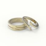 Gouden trouwring met open design, gezet met diamant.