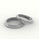 witgouden trouwring met reliëf