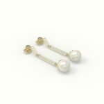 Gouden pareloorbellen met diamanten.