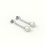 Witgouden pareloorbellen met diamanten.