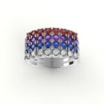 Witgouden ring met vier lagen edelstenen, in verschillende kleuren.