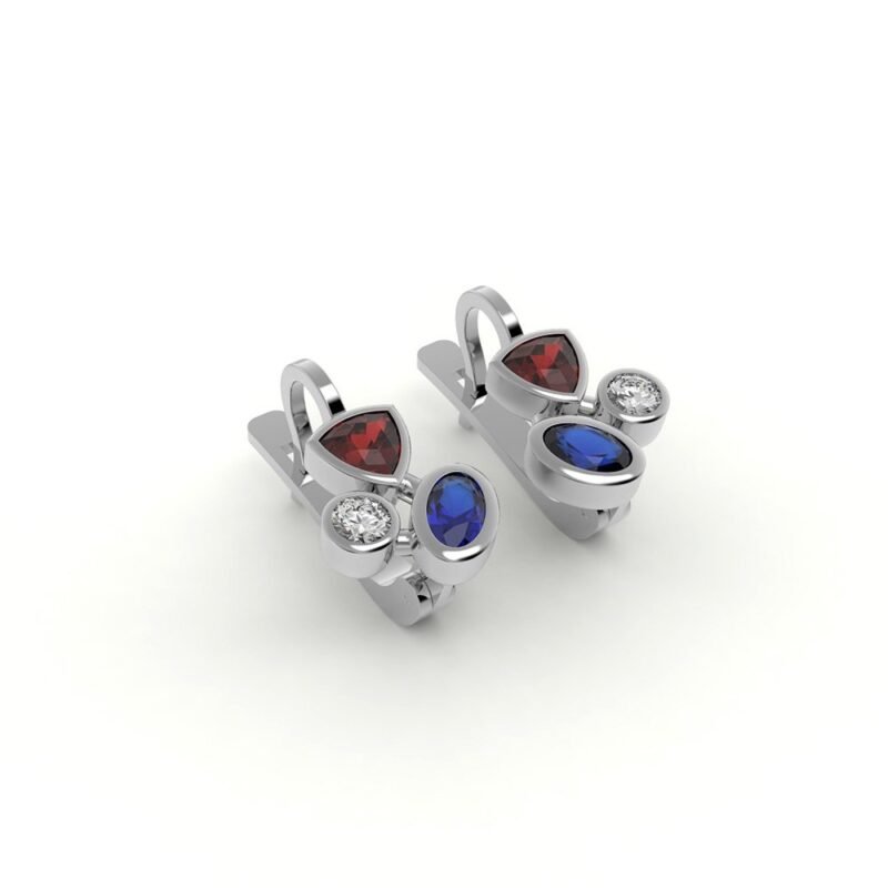 Witgouden asymmetrische oorbellen gezet met diamant, robijn en saffier.