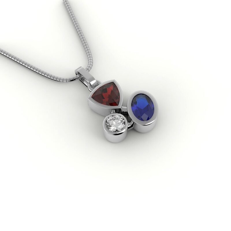 Witgouden asymmetrische hanger gezet met diamant, robijn en saffier.