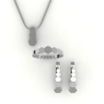 Set van matchende witgouden sieraden met hexagon design.