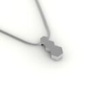 Witgouden hanger met hexagon design.