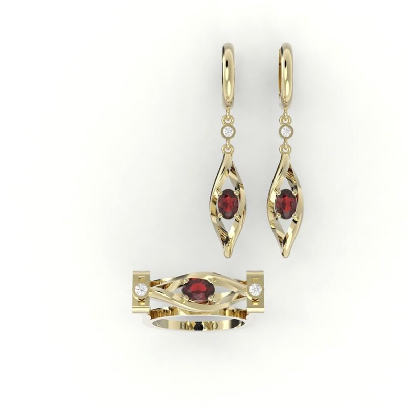 Set van gouden design ring en oorbellen gezet met diamanten en centrale robijn.