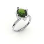 Witgouden solitaire ring met peridot omringd door diamanten.