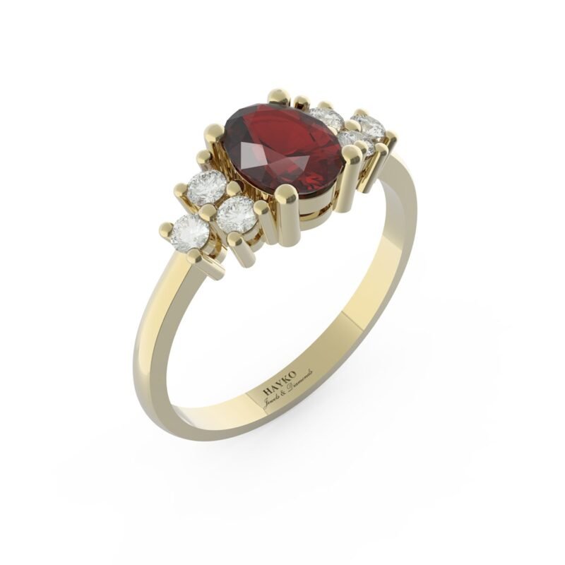 Gouden ring met robijn en diamanten gezet.